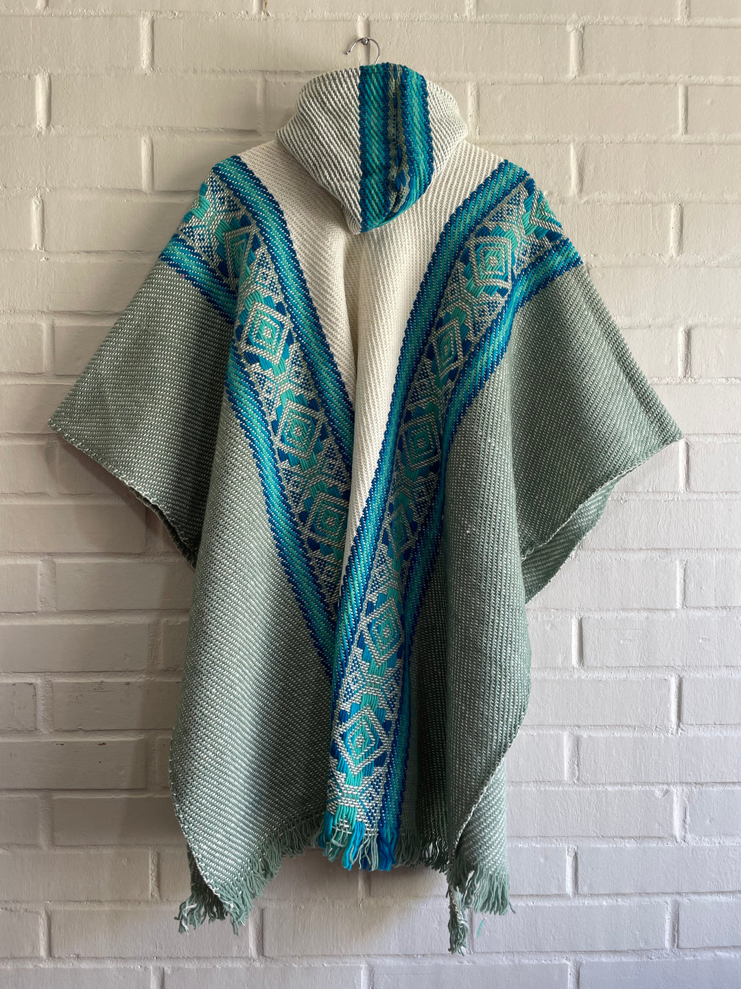 PONCHO DE OVEJA CISNE
