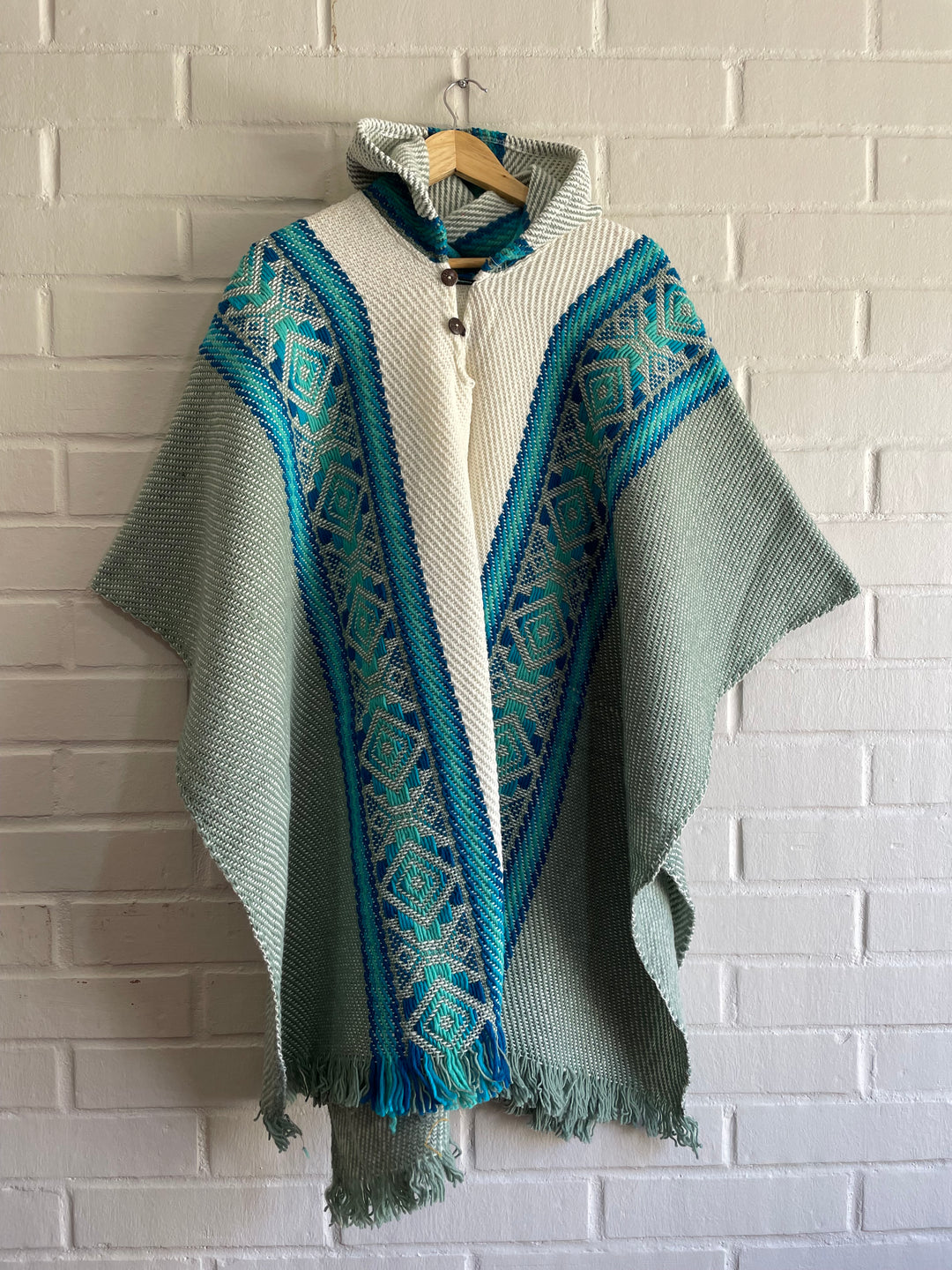 PONCHO DE OVEJA CISNE