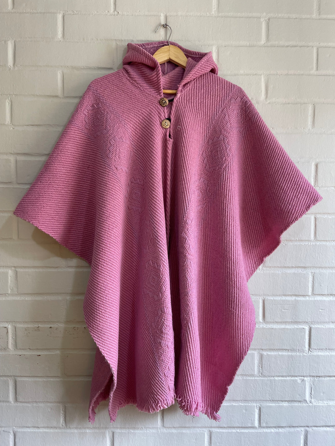 PONCHO DE OVEJA ROSA PASTEL